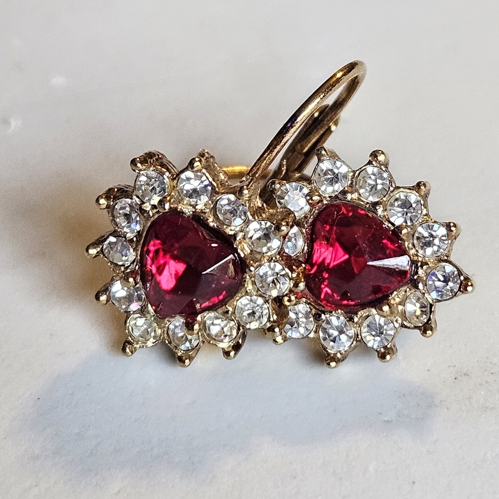 Gold tone brass earrings with rhinestones and ruby red gemstone